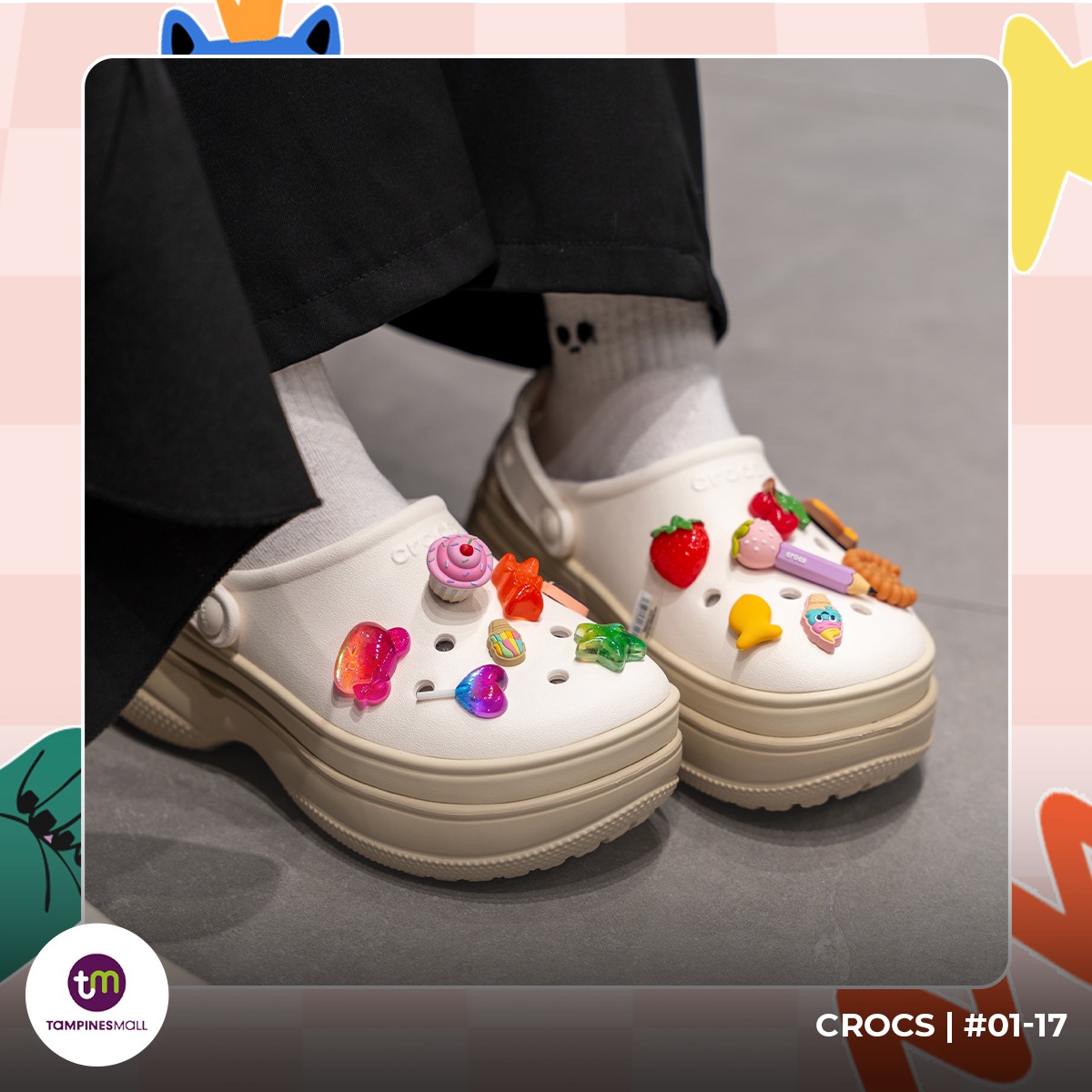 Various Crocs footwear models on display