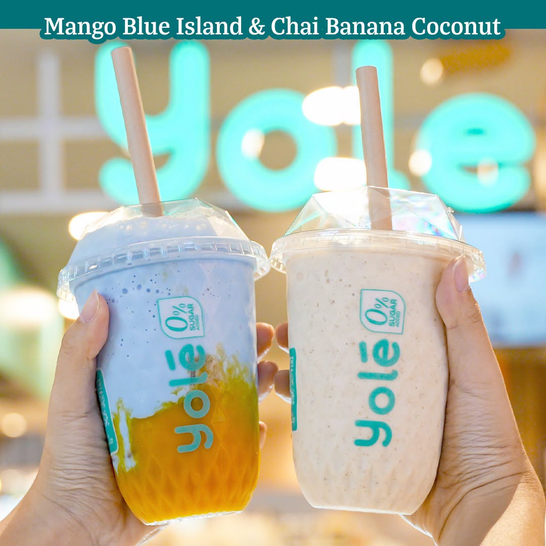Yolé Mango Blue Island and Chai Banana Coconut drinks side by side