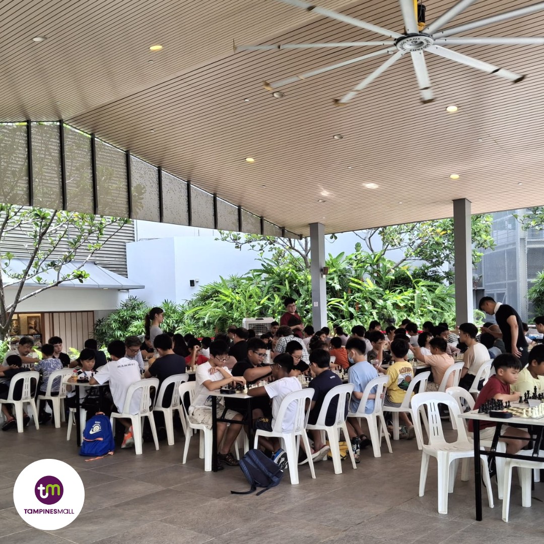 Close-up of chess pieces on a board at the PlayNow! Grand Prix