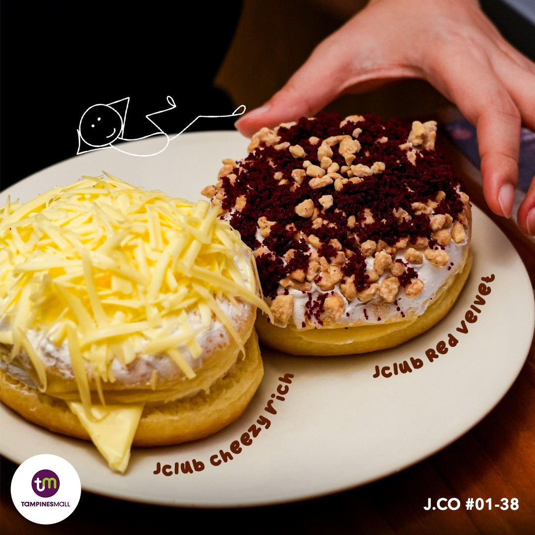 A vibrant display of festive drinks and donuts at J.CO