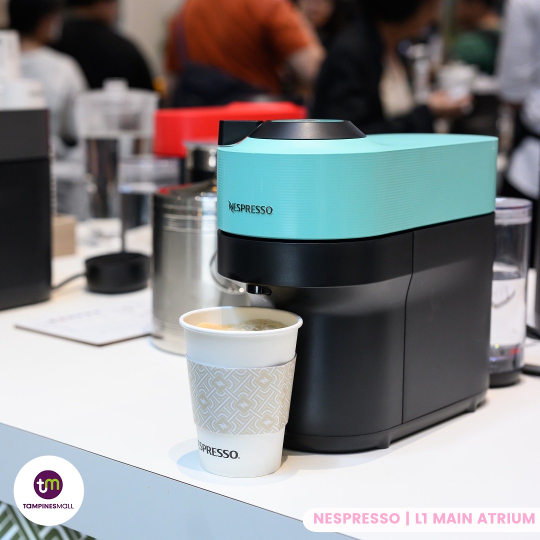 An interactive display showcasing the Nespresso coffee journey.
