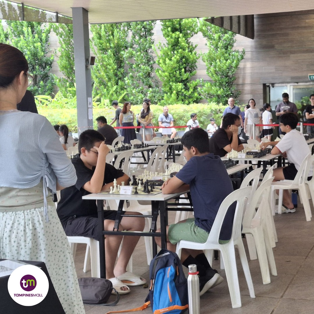 Chess players in intense match during the PlayNow! Grand Prix Challenge