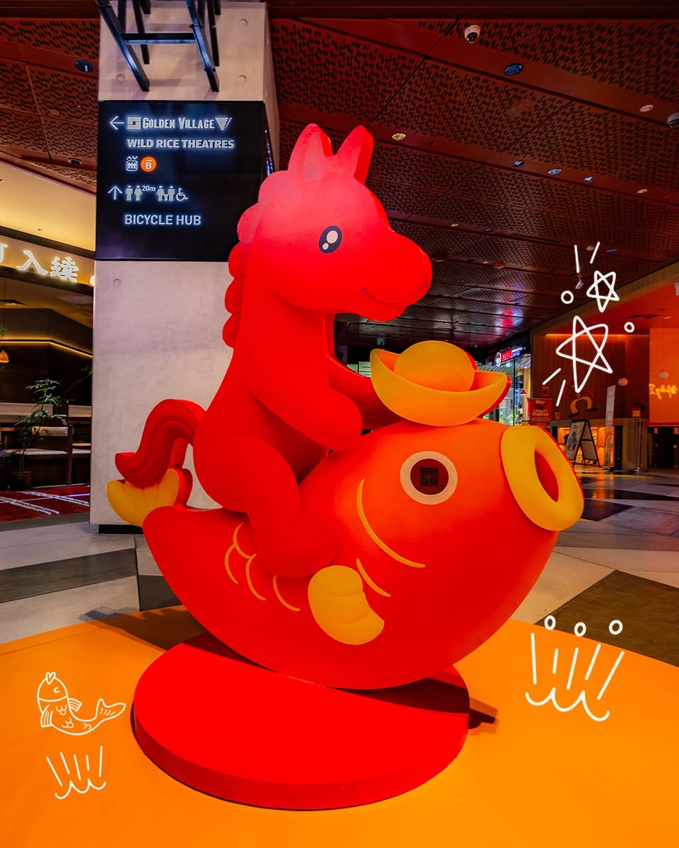 The dazzling rotating horse carousel centerpiece at the festive atrium.