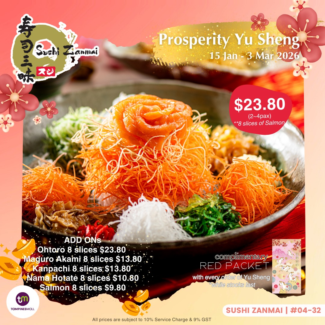 A vibrant Prosperity Yu Sheng platter from Sushi Zanmai SG featuring fresh salmon slices.